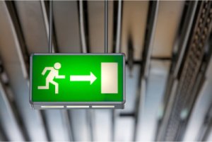 Exit sign by Shutterstock.com/photoinnovation